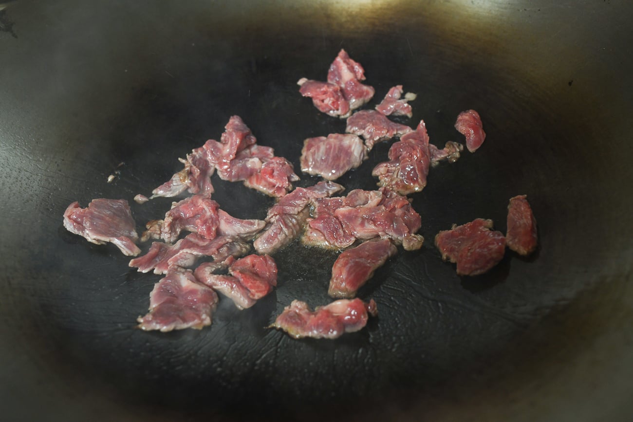 Searing beef in wok