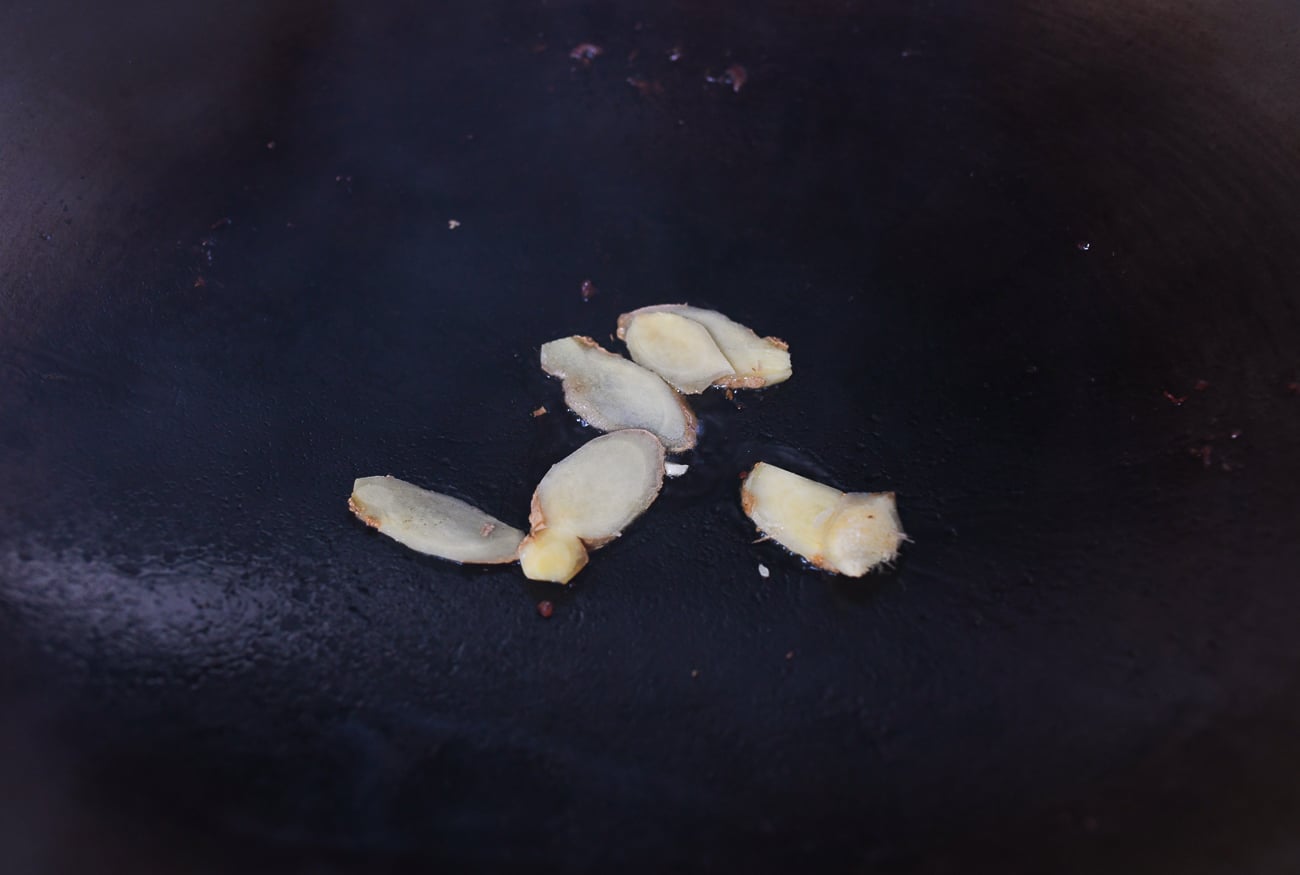 Ginger slices in wok