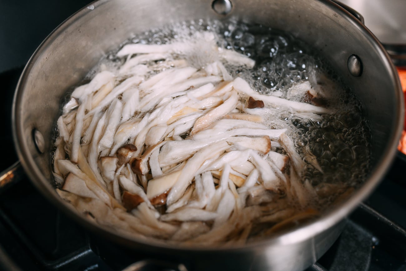 Blanching shredded king oyster mushrooms