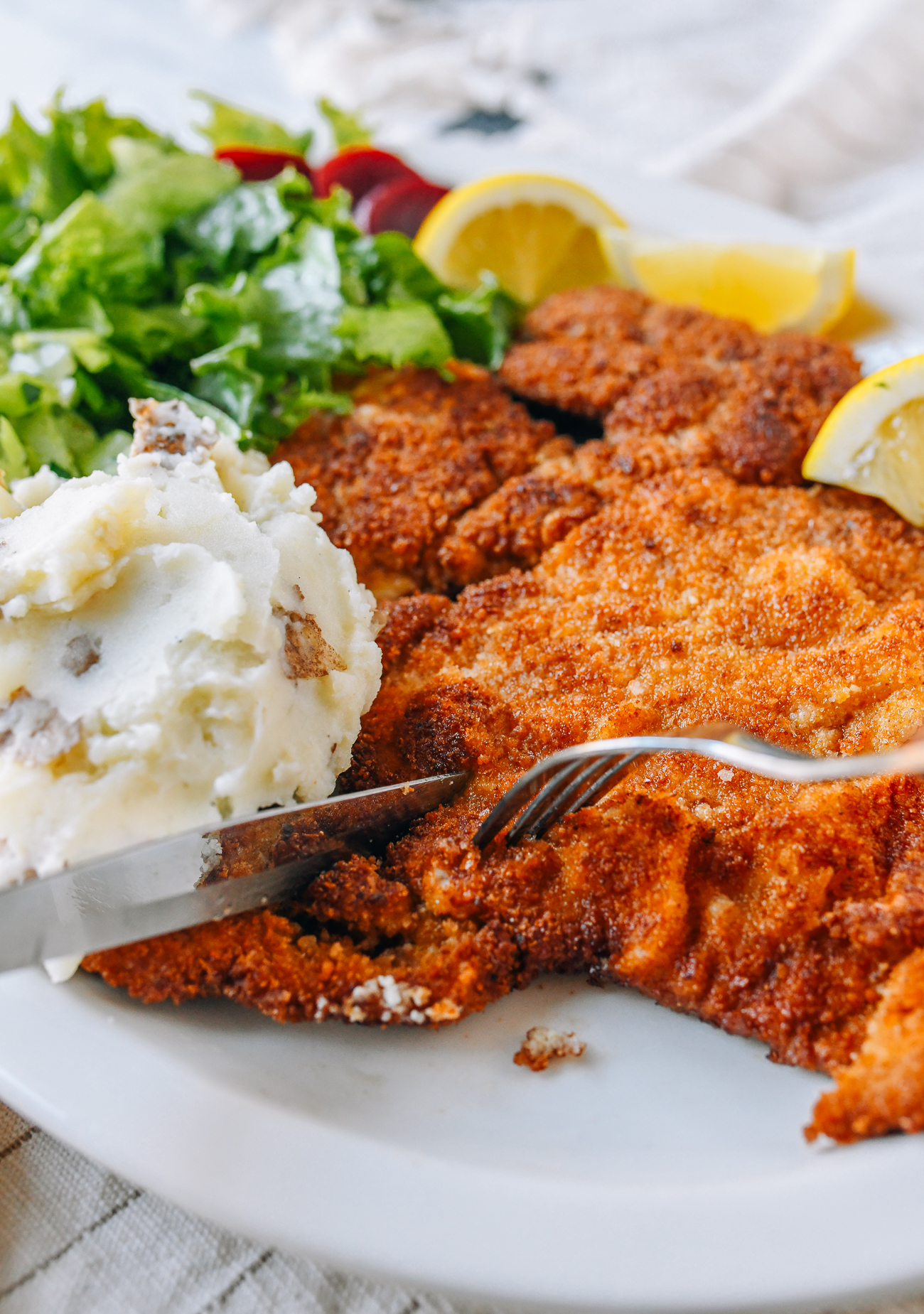 Cutting into Pork Schnitzel