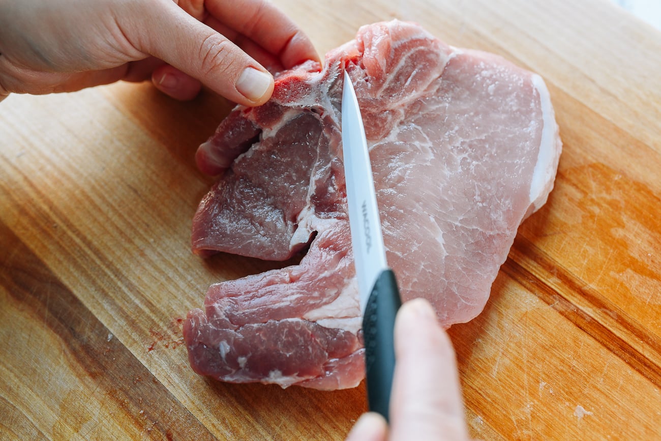 Trimming bone out of pork chop