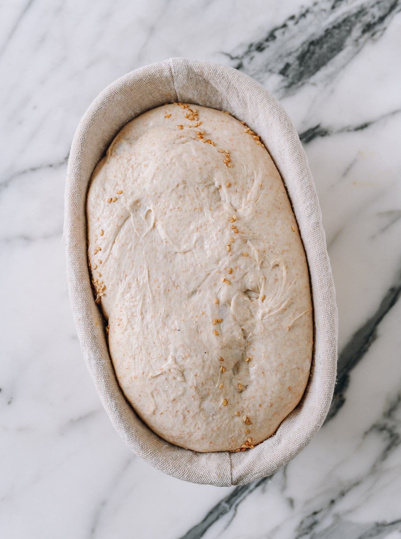 Sourdough in banneton after bulk fermentation