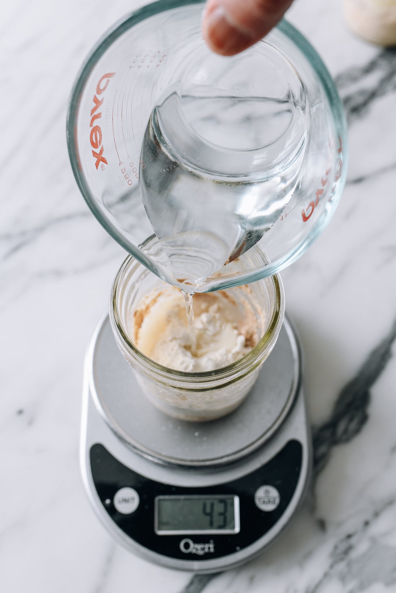 Adding water to starter