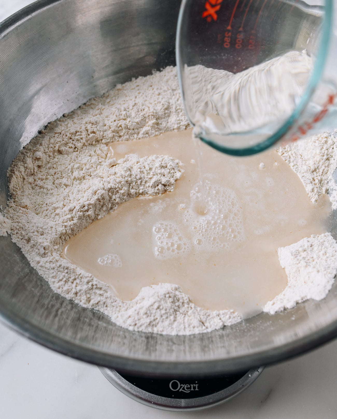Adding water to flour