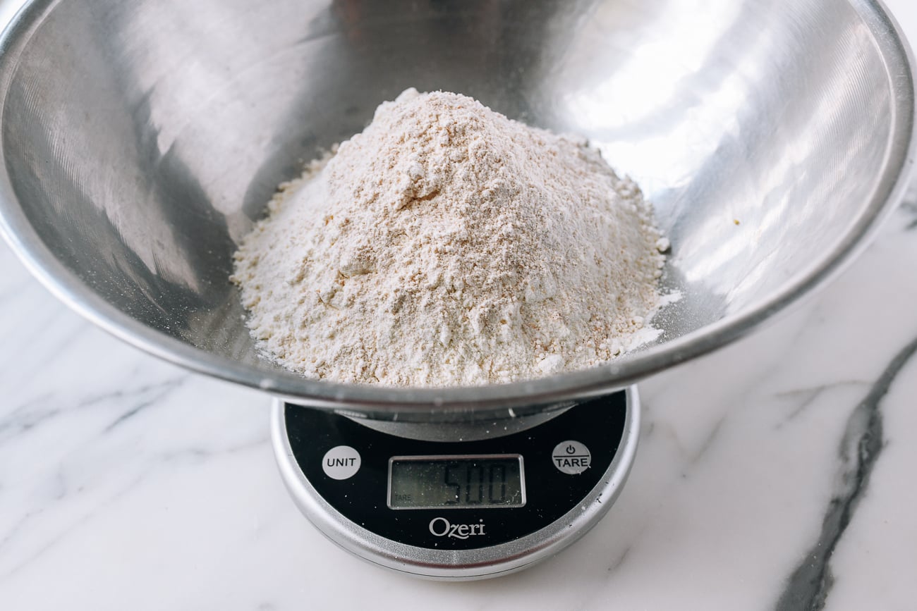 500g of bread flour and whole wheat flour in stainless steel bowl