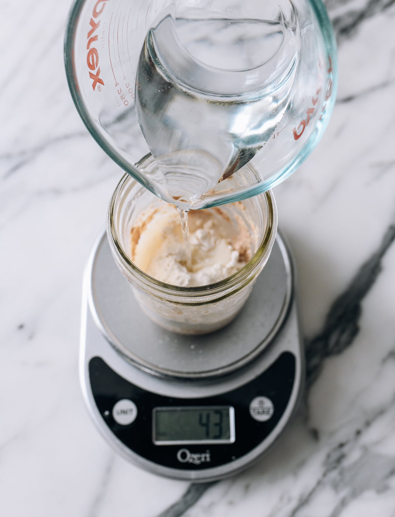 Feeding starter with water