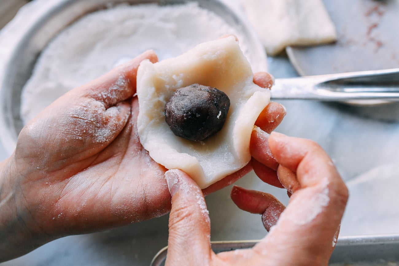Red bean filling in center of mochi dough