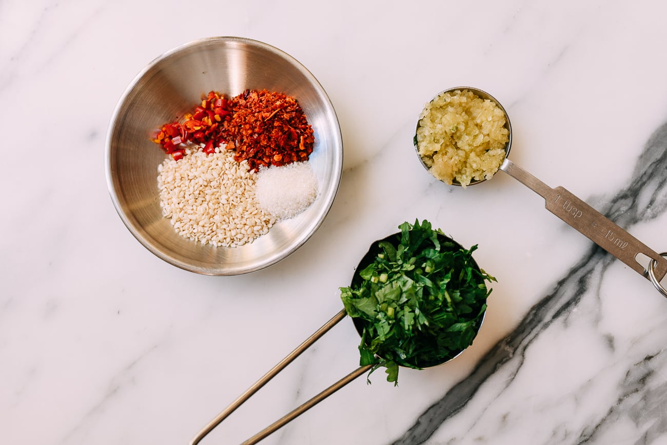 chili, chili flakes, sesame seeds, sugar, garlic, cilantro