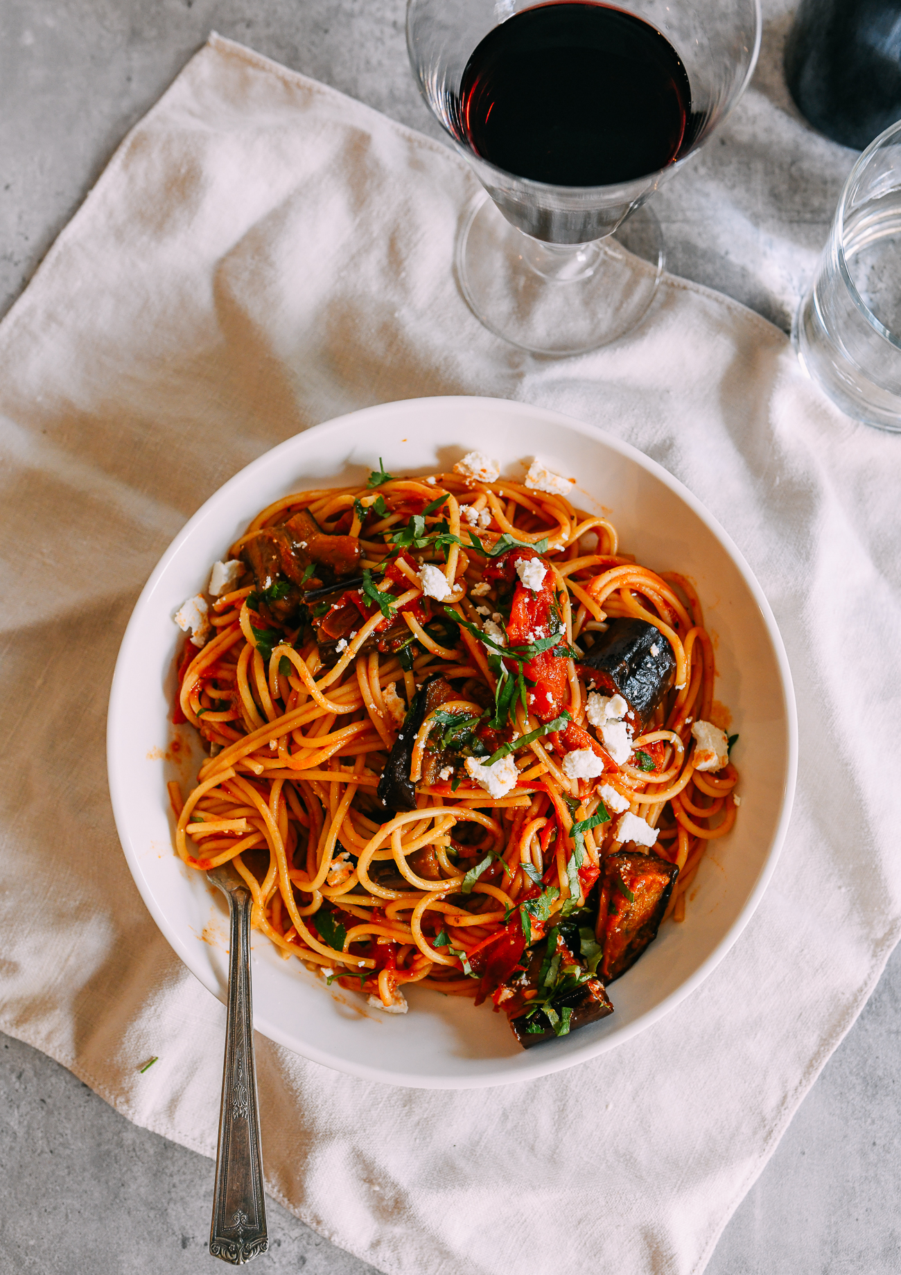Pasta alla norma in white bowl