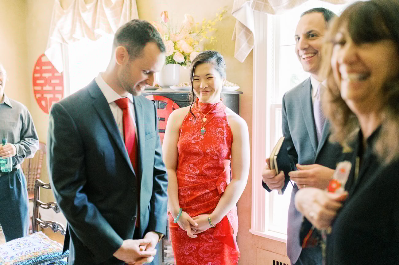 Justin, Sarah, and officiant Andy during Ketubah signing