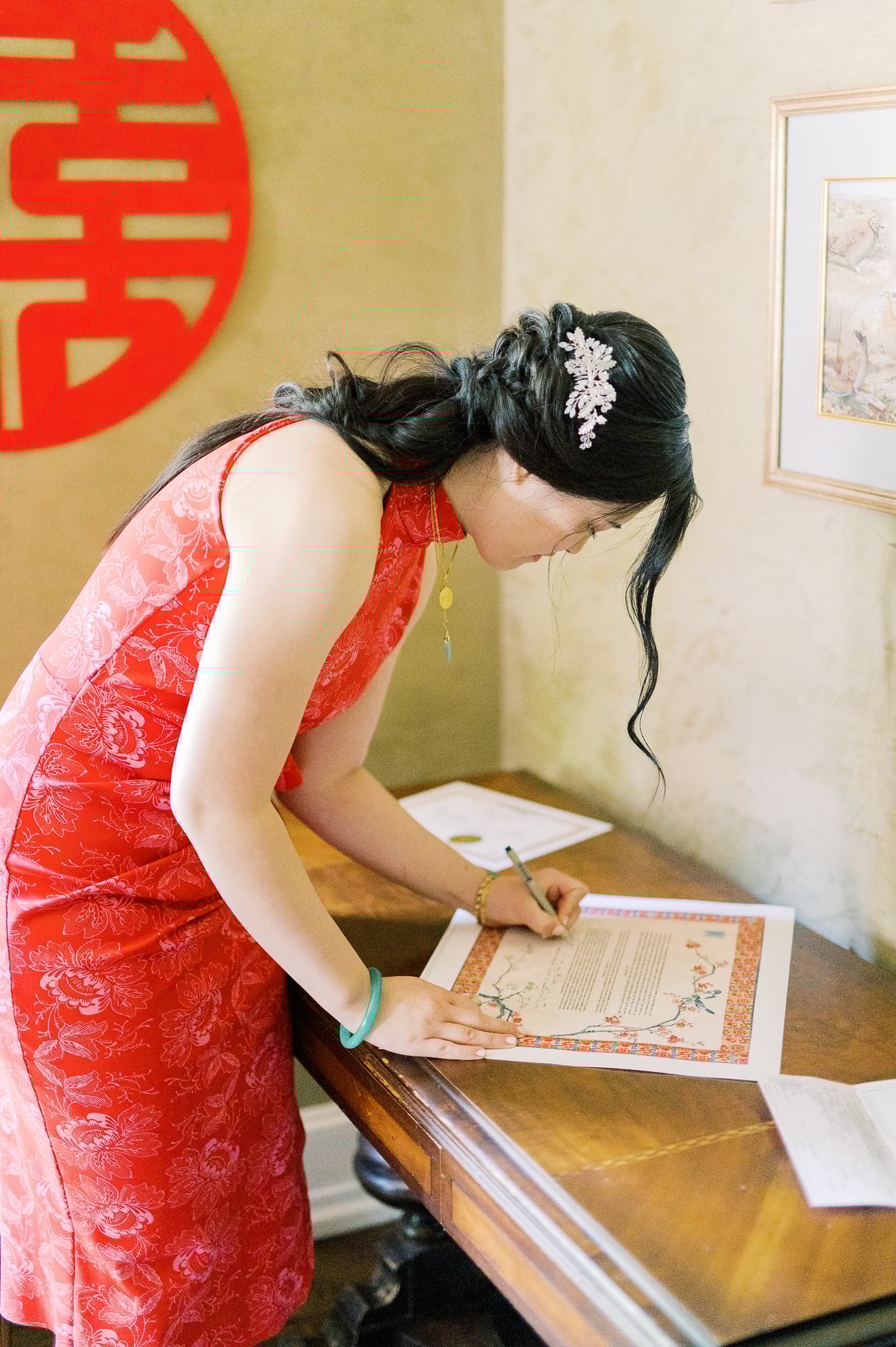 Sarah signing Ketubah