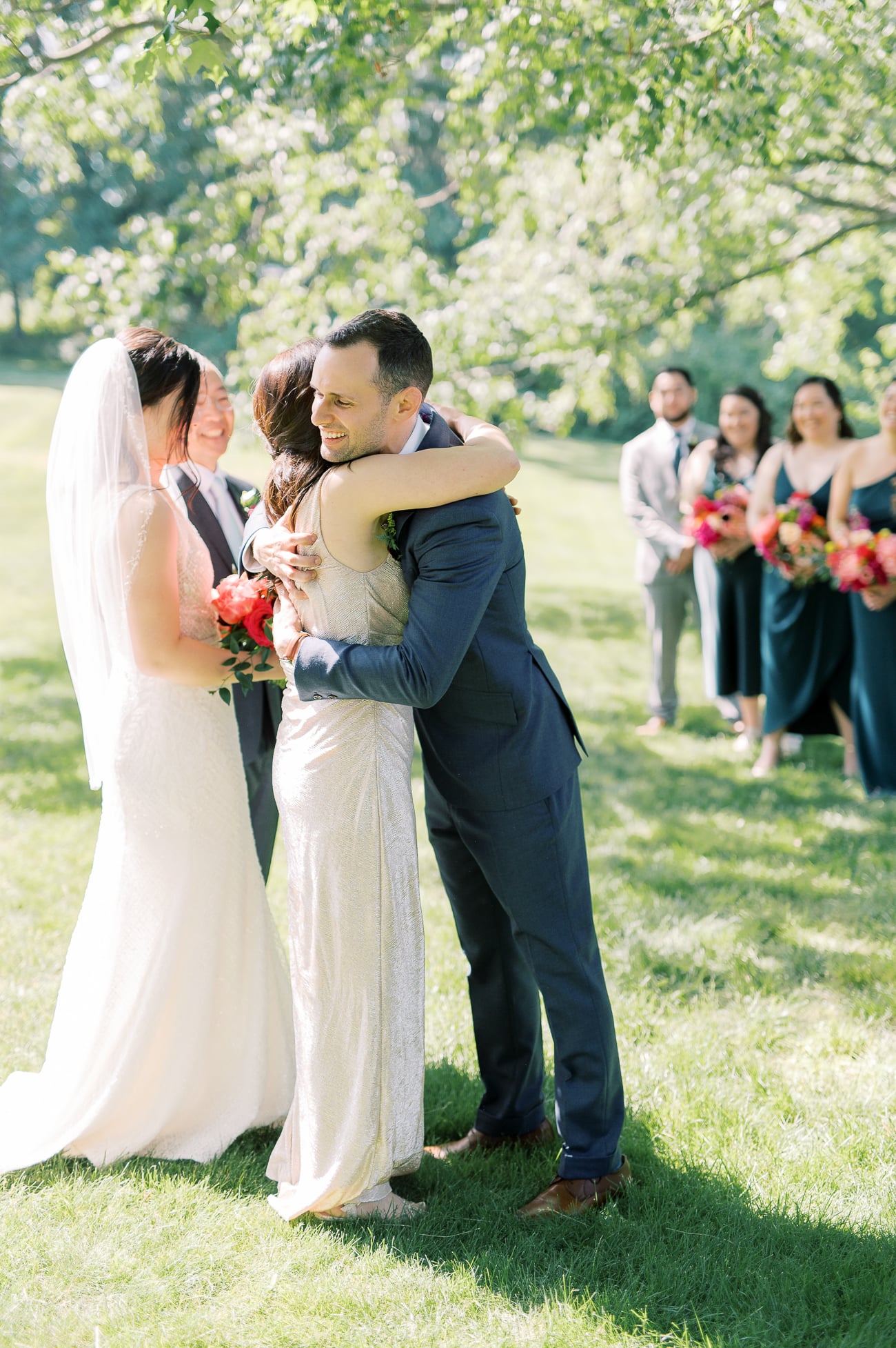 Justin hugging Judy at the end of the aisle