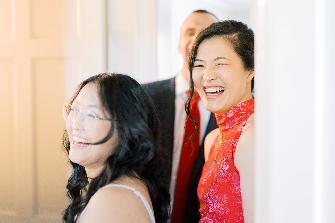 Sarah and Kaitlin laughing during Chinese door games