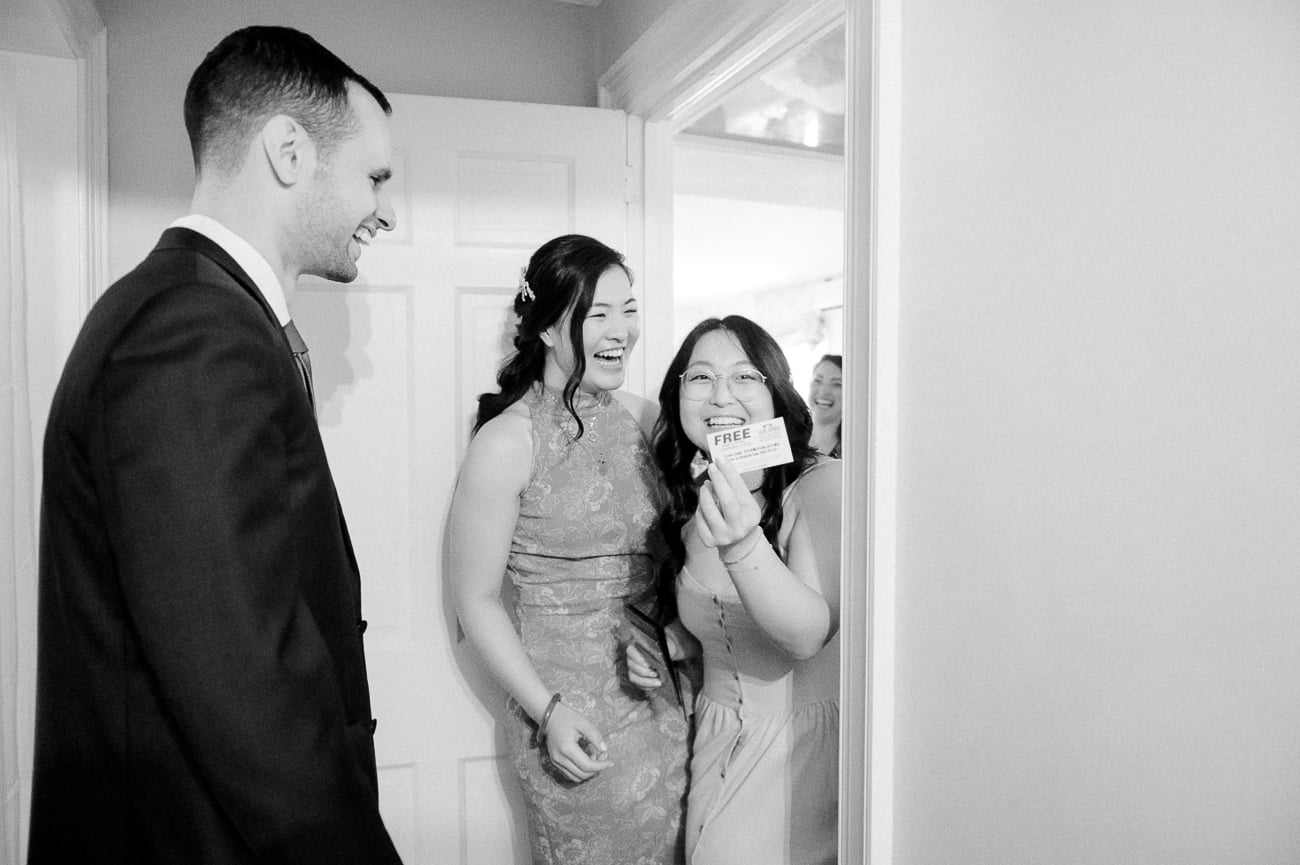 Kaitlin holding up Papa John's Coupon