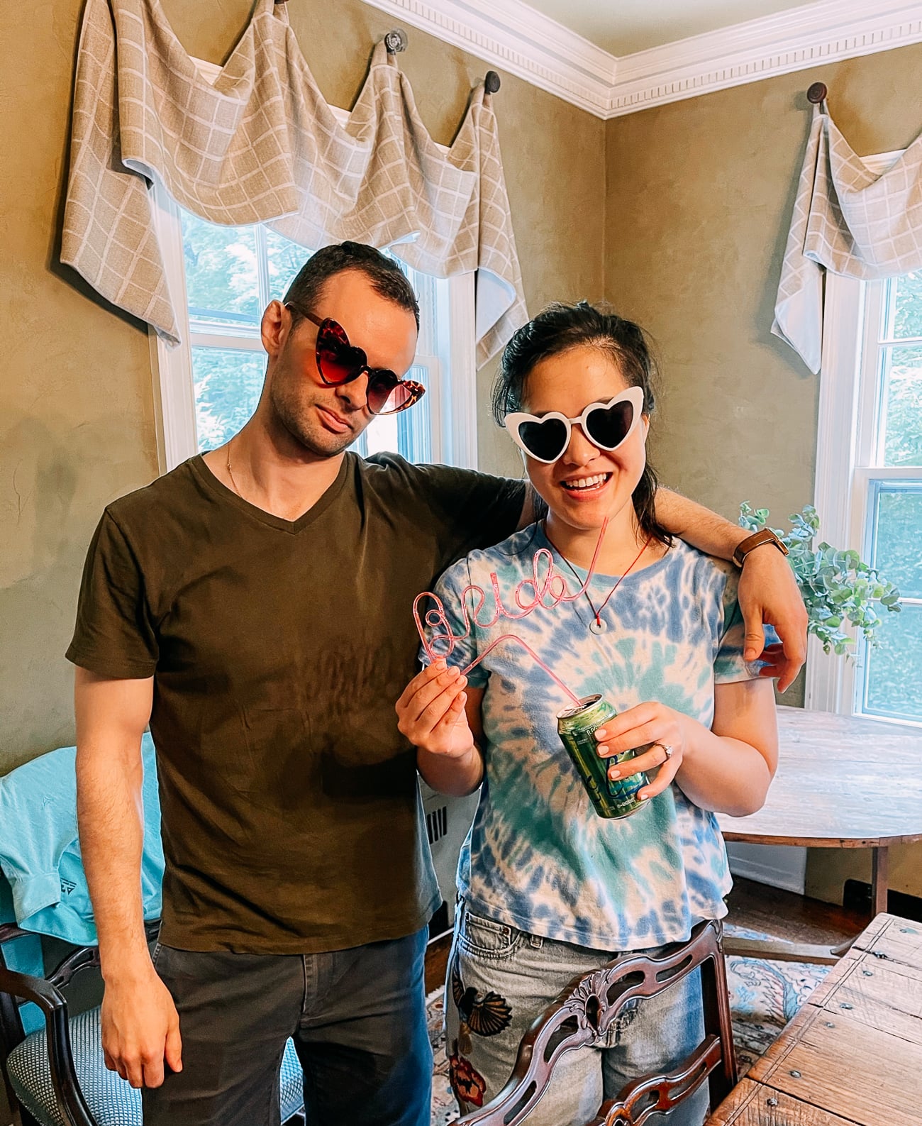 Justin and Sarah in heart shaped sunglasses