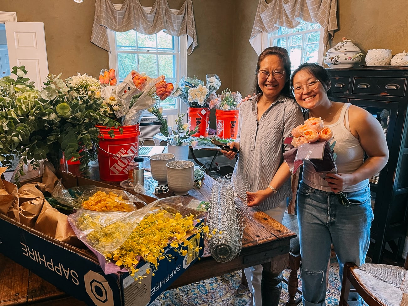 Judy and Kaitlin working on flowers