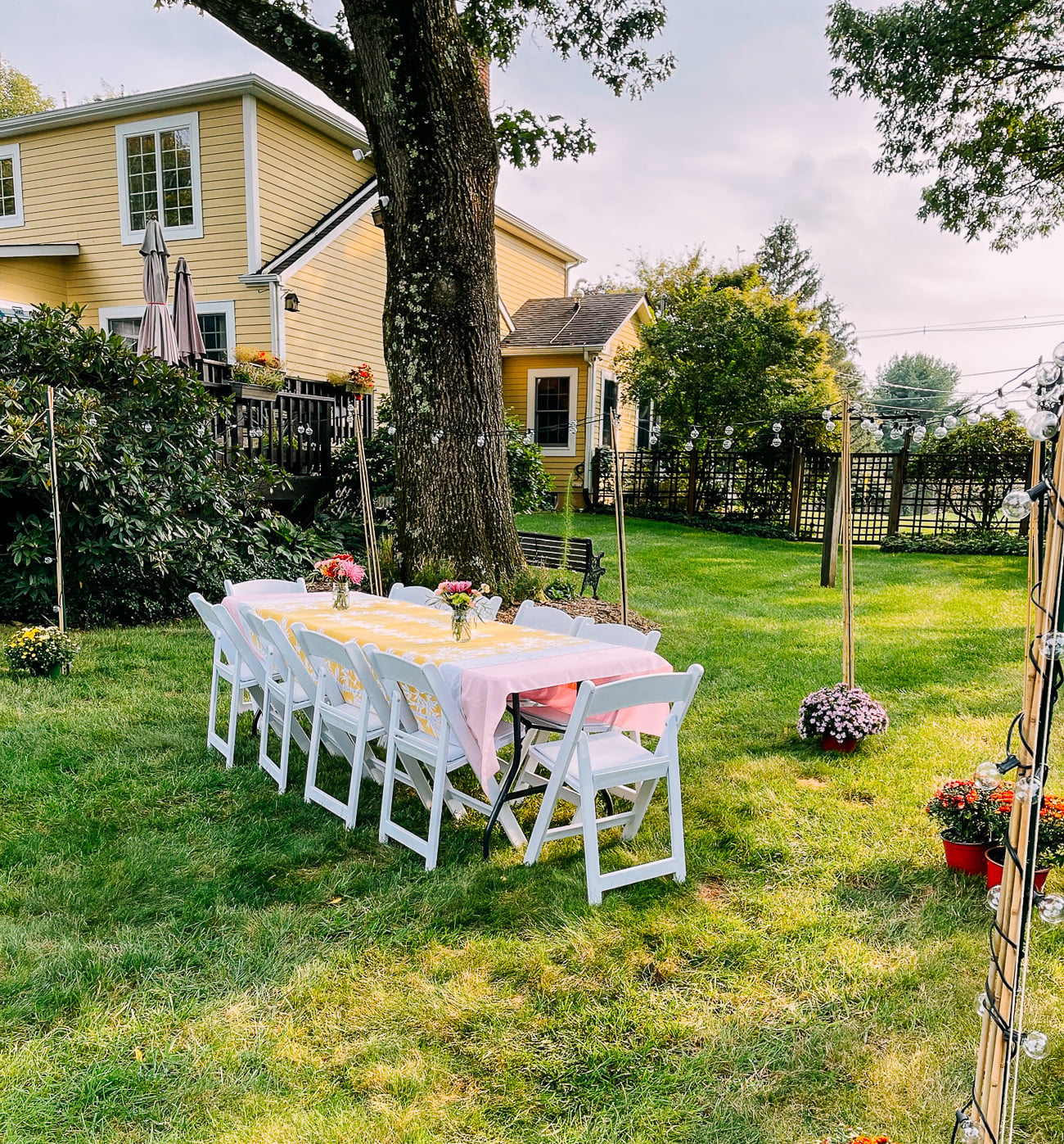 Outdoor table with string lights for mid-autumn festival