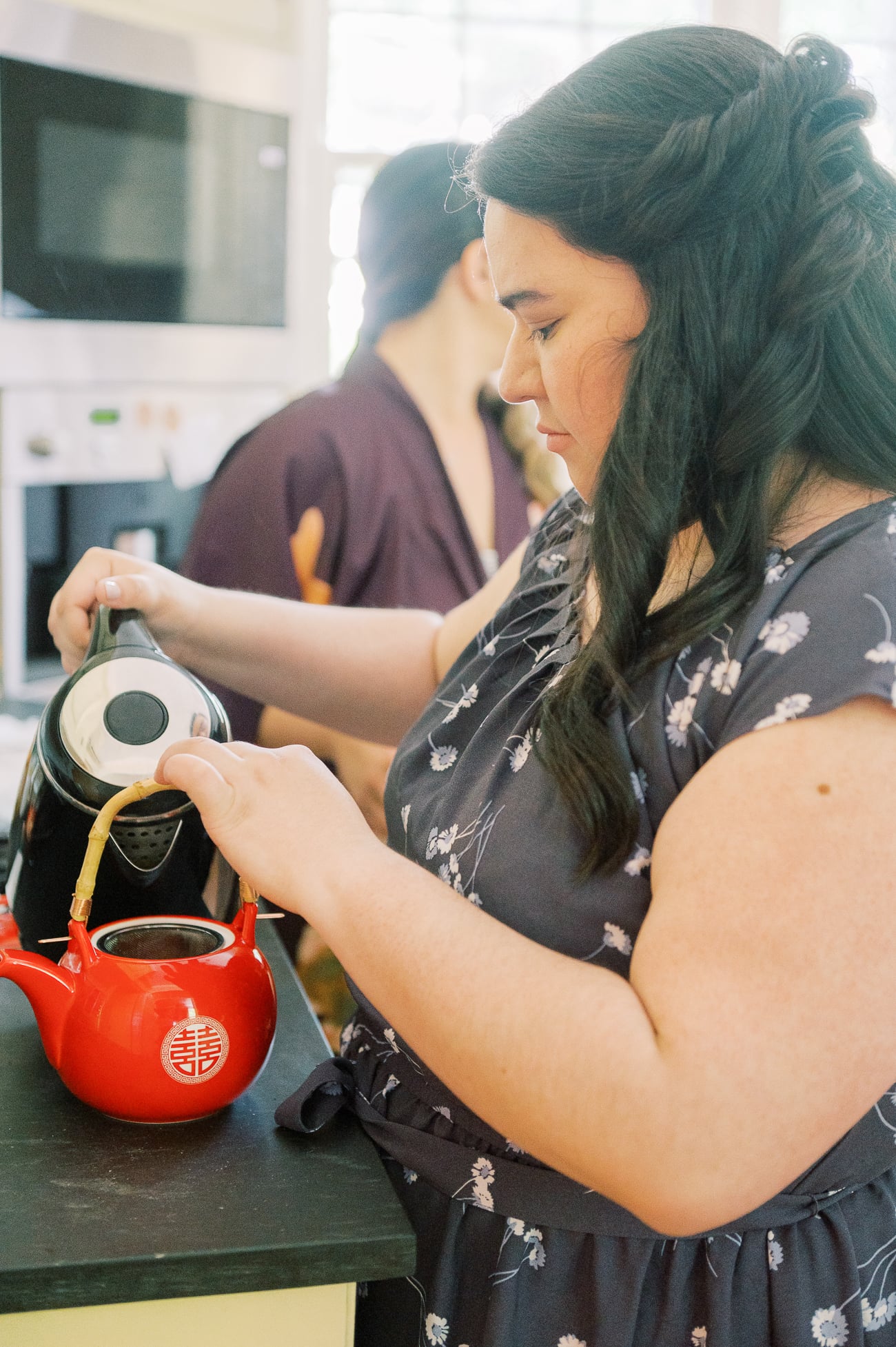 Stephanie preparing tea for tea ceremony