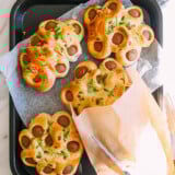 Chinese flower hot dog buns on tray