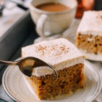 Digging into pumpkin tres leches cake with a spoon