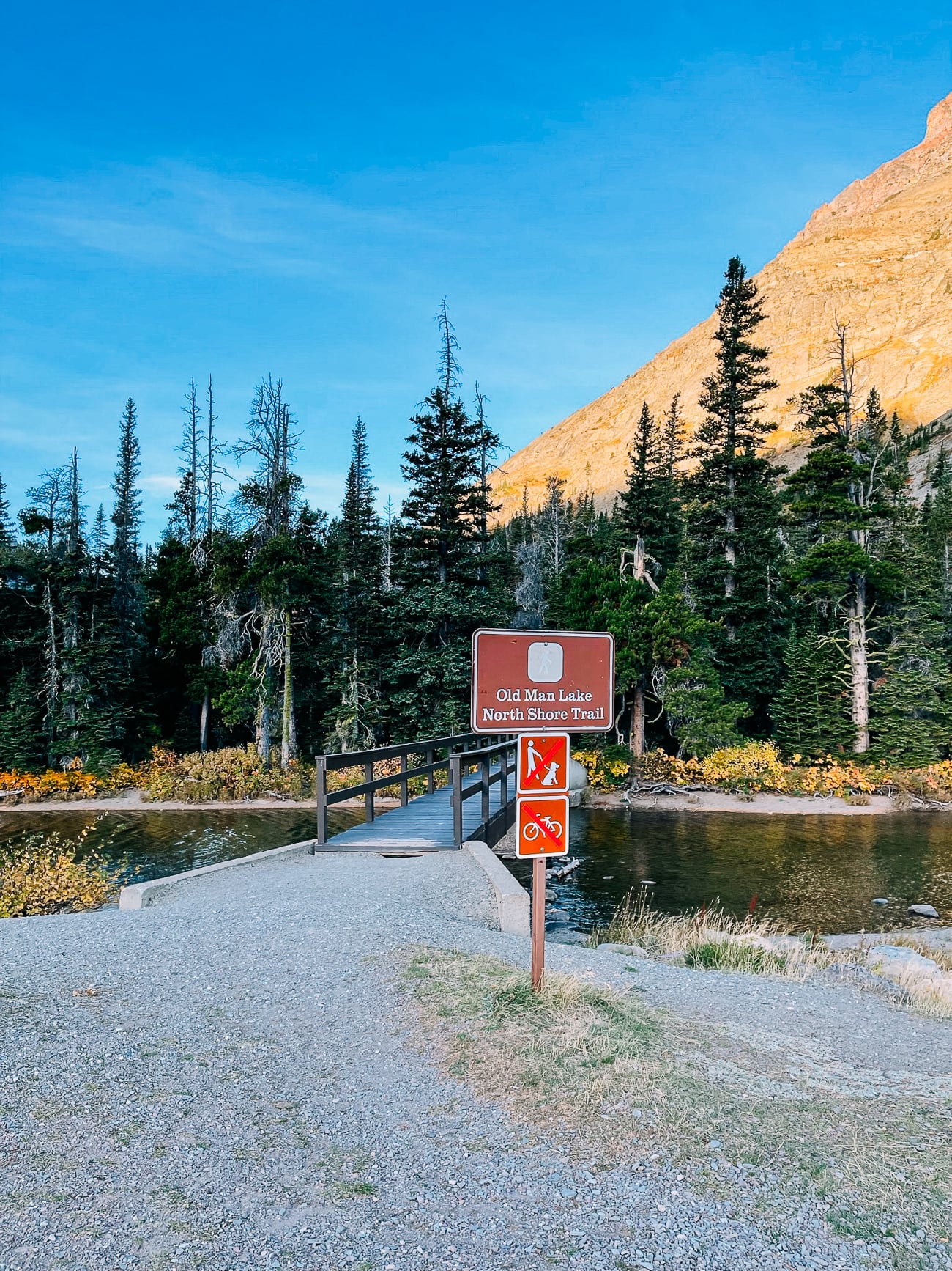 Old Man Lake North Shore Trail Sign at Footbridge near Two Medicine Campground