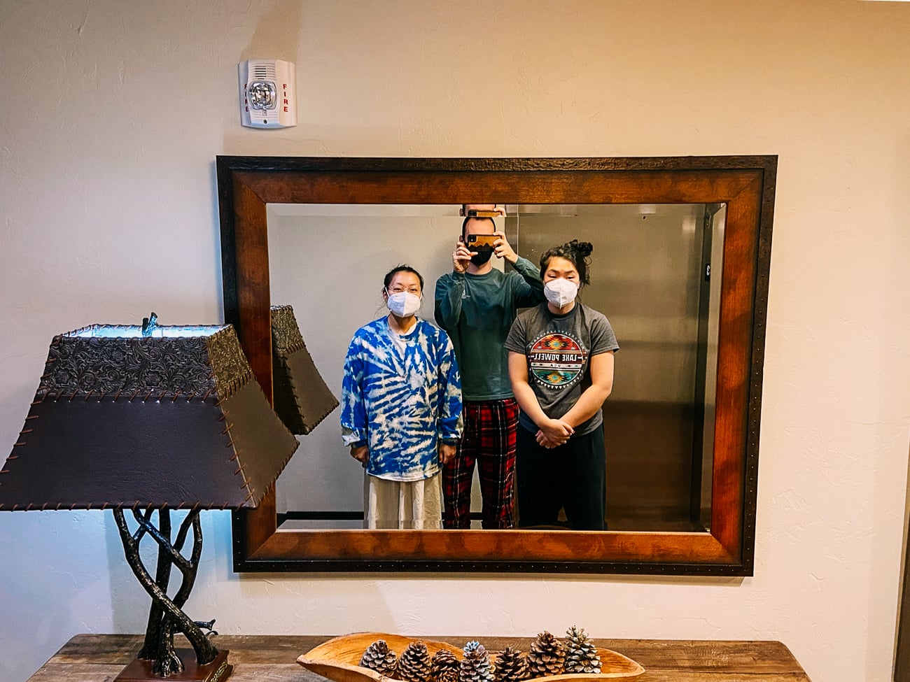 Kaitlin, Justin, and Sarah waiting for elevator in hotel