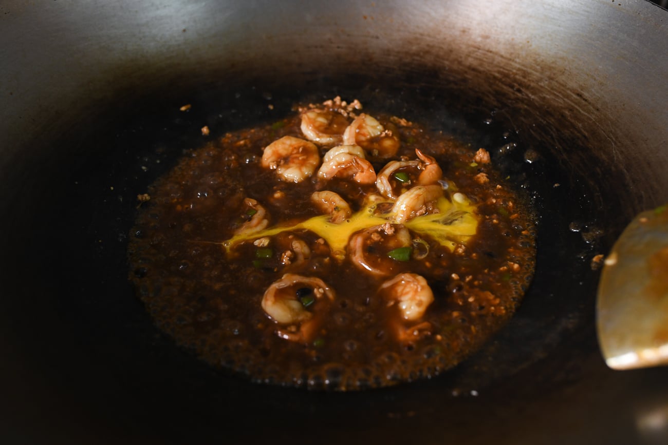 Beaten egg added to sauce