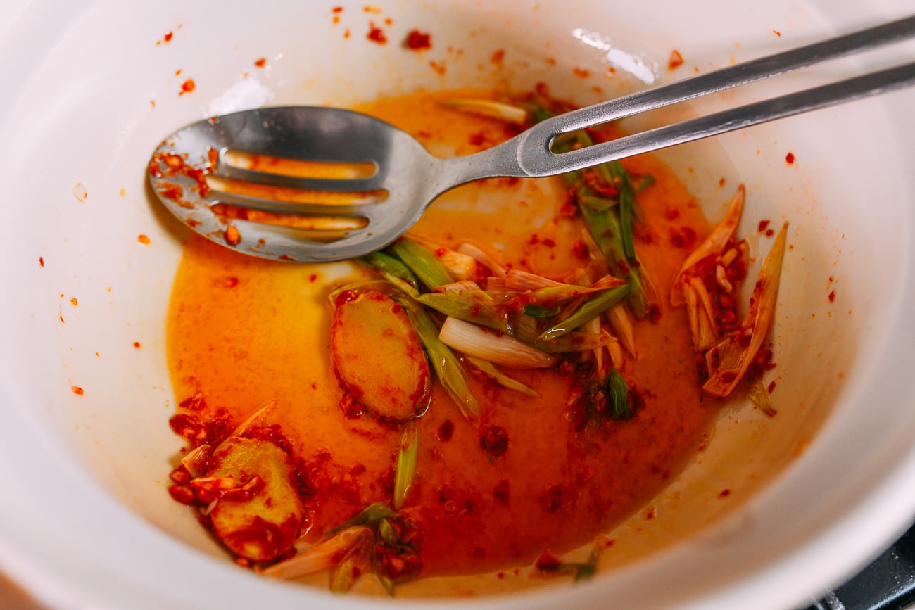 Oil turned red by cooked tomato paste