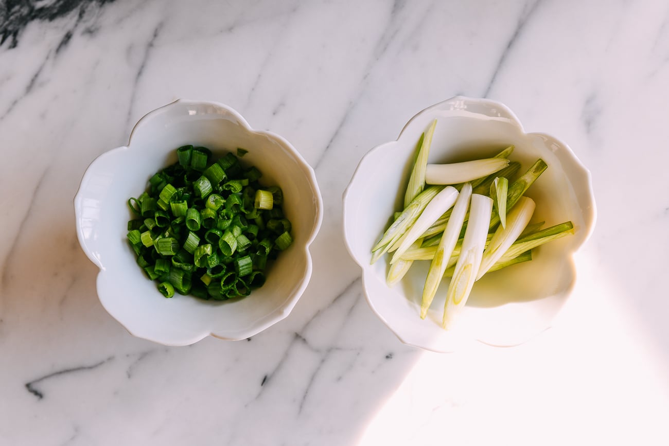 Chopped scallion greens and slices of scallion whites