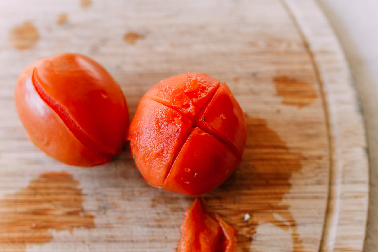 Peeling a blanched tomato