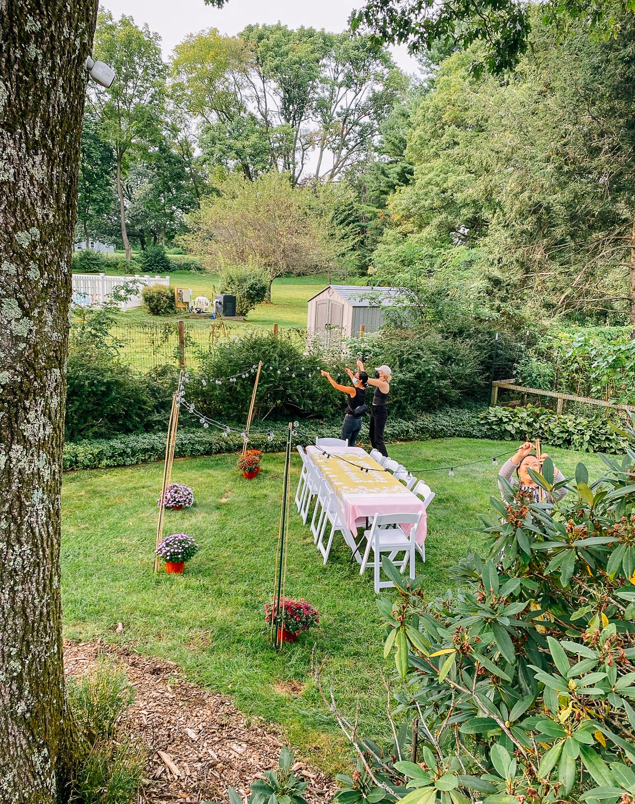 Setting up outdoor dining in the backyard
