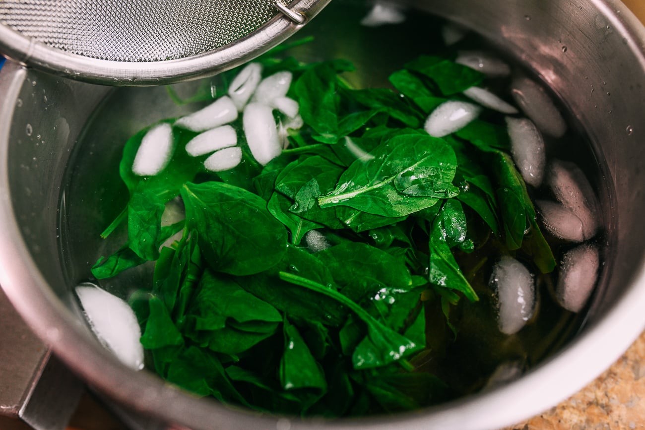 Wilted spinach in ice bath