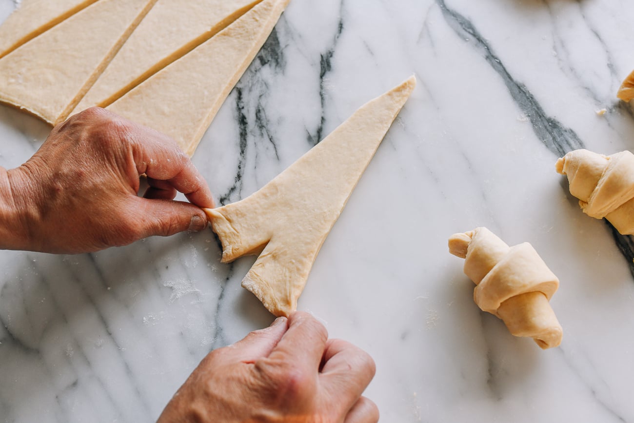 Pulling two ends of dough apart