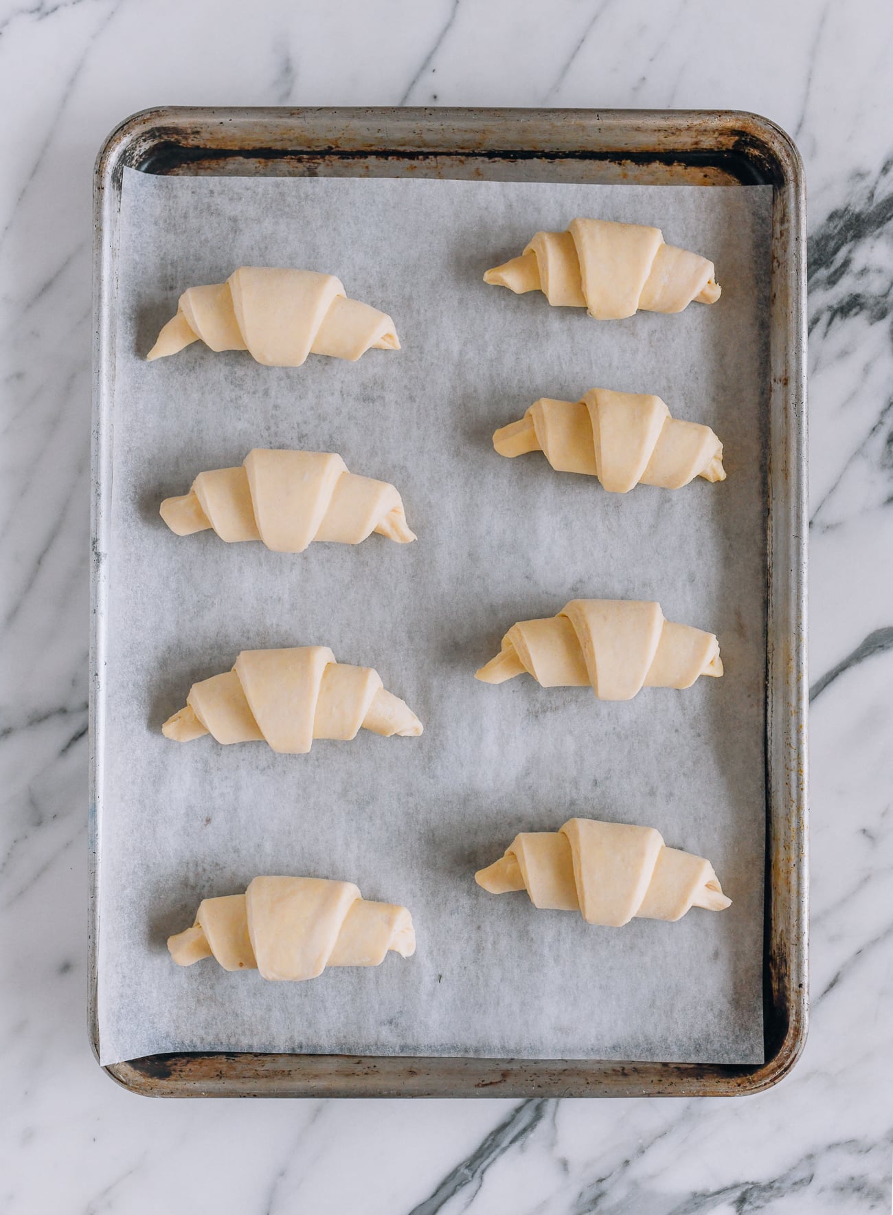 8 croissants on a sheet pan