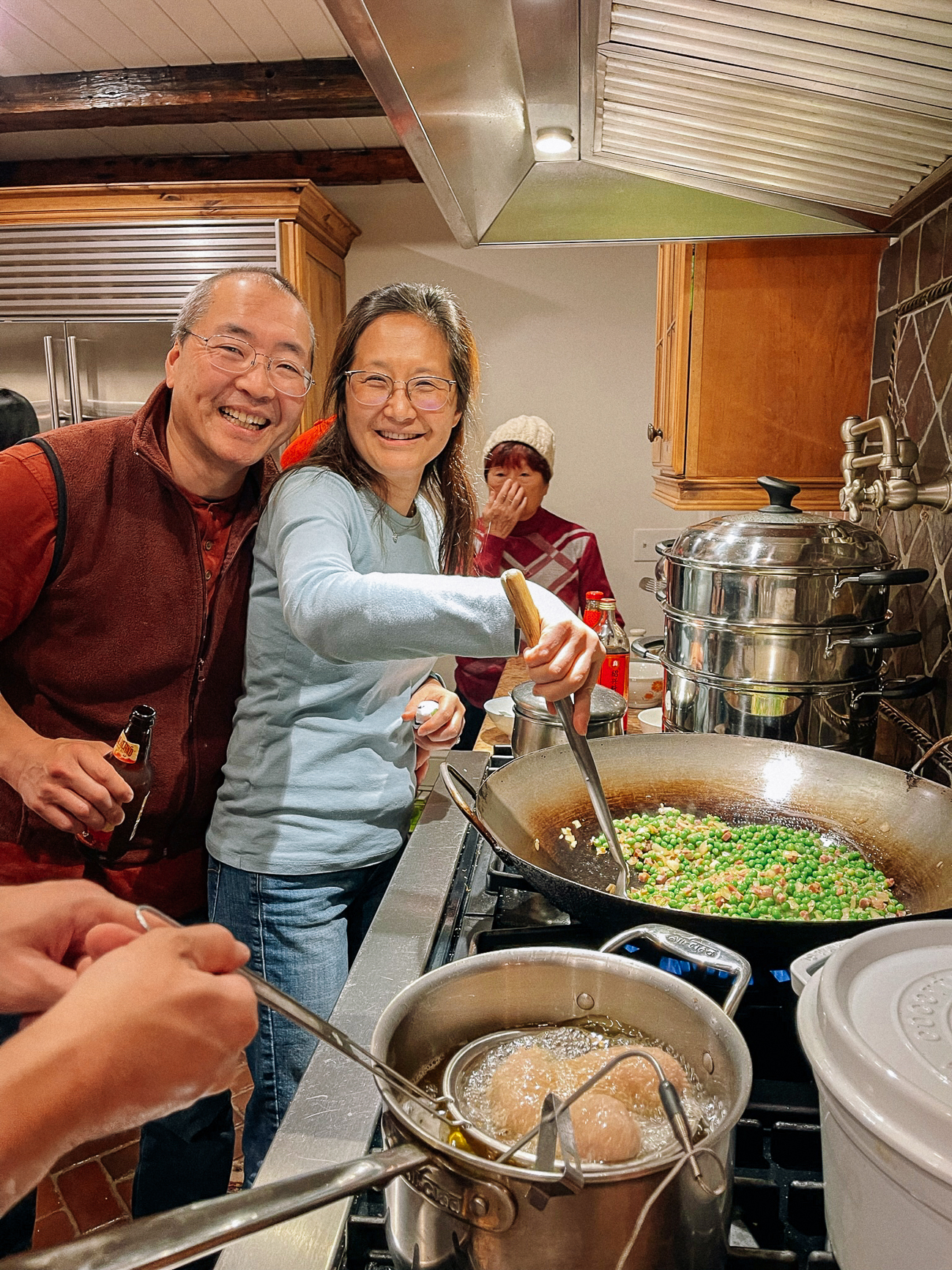 Bill and Judy cooking at the wok