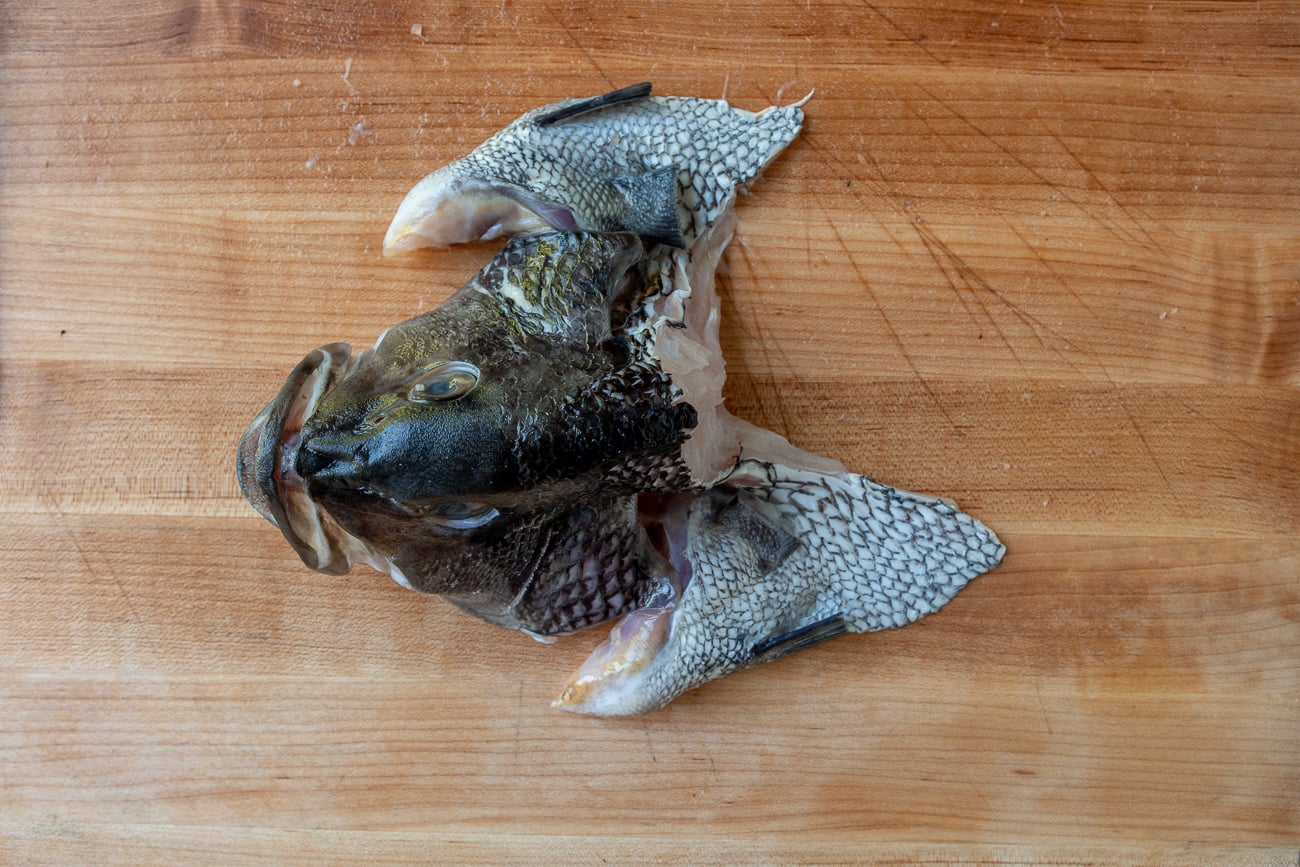 Fish head on cutting board
