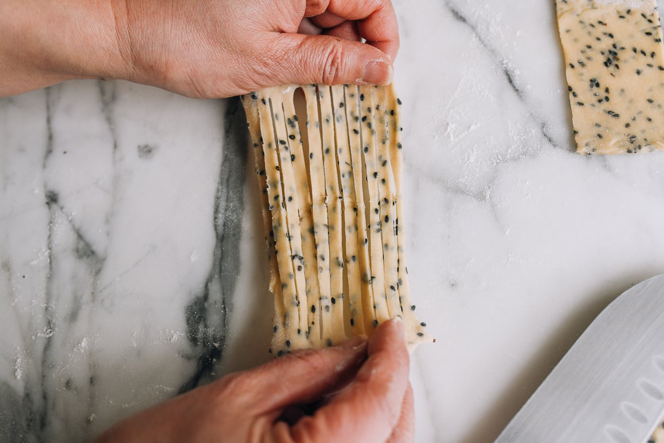 Stretching cut dough