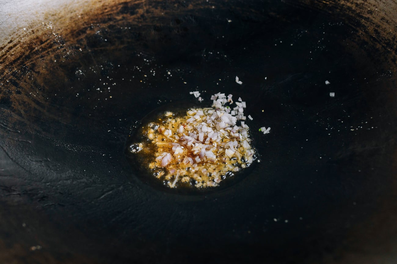 onion in oil in wok