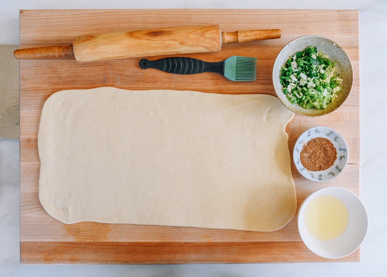 Dough rolled into large rectangle