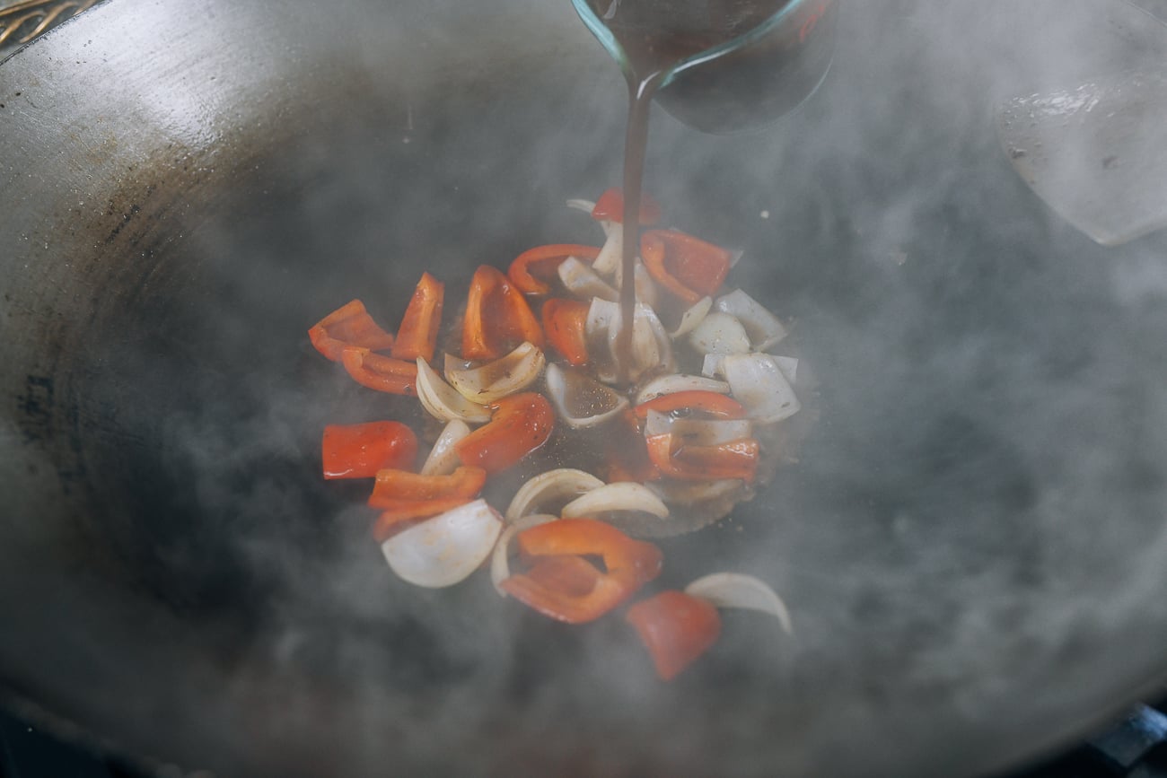 Adding sauce mixture bac