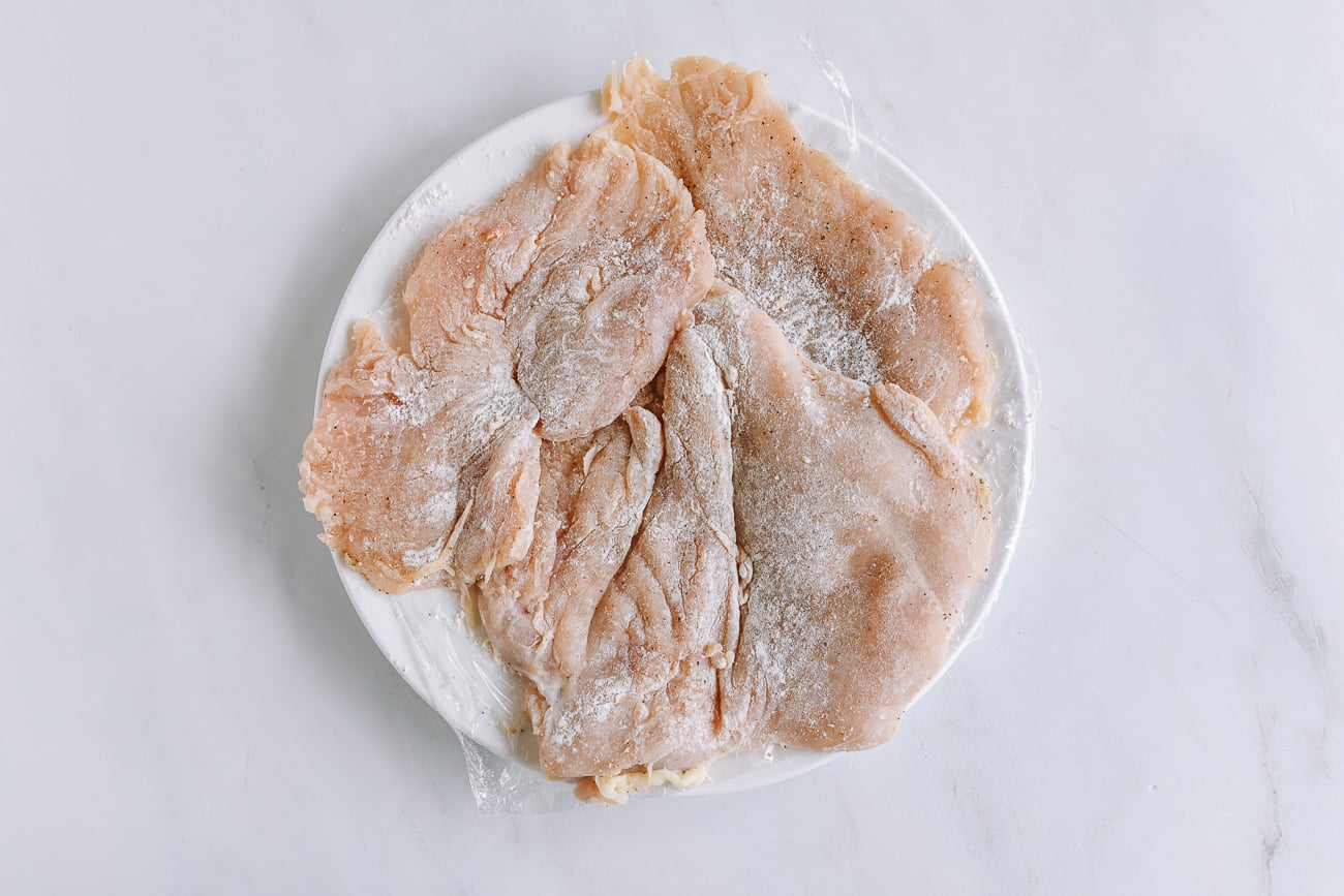 floured chicken breasts