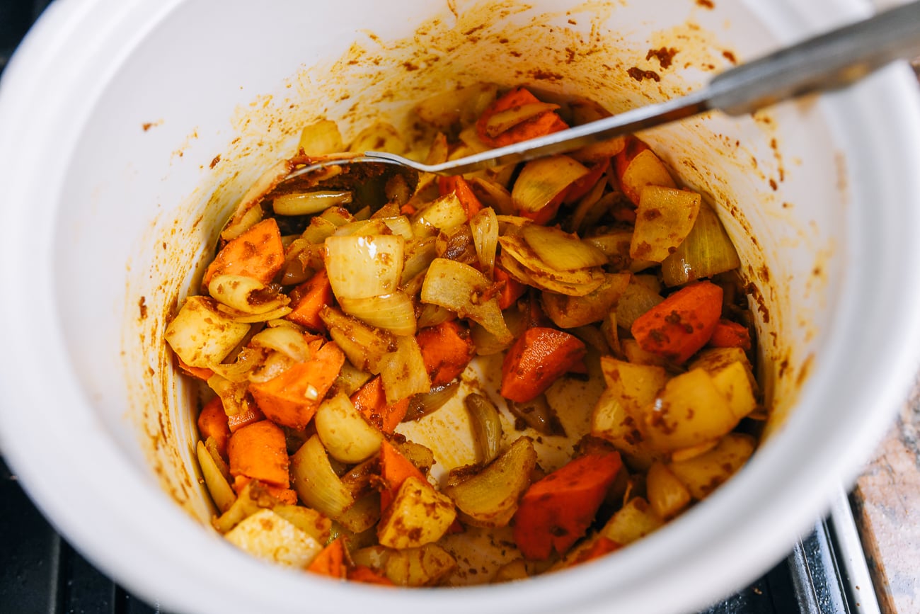 curry mixed with onions, potatoes, carrots