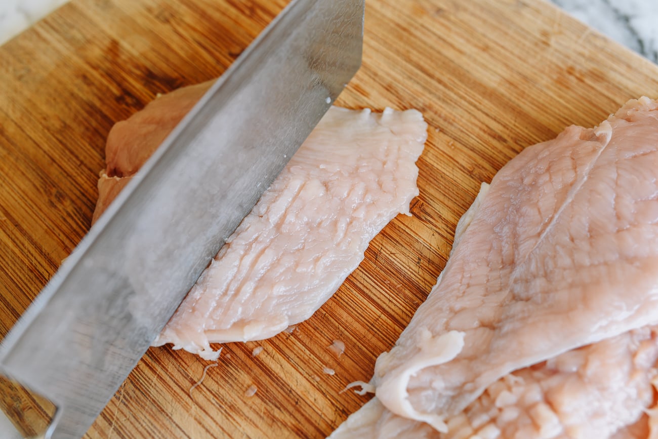 pounding chicken breast with back of knife