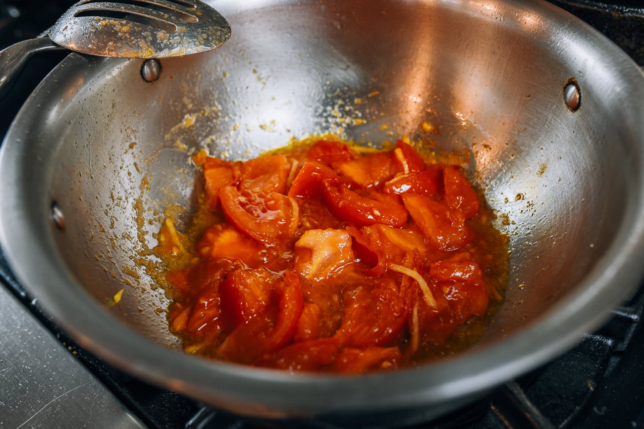 cooked tomatoes in soup pot