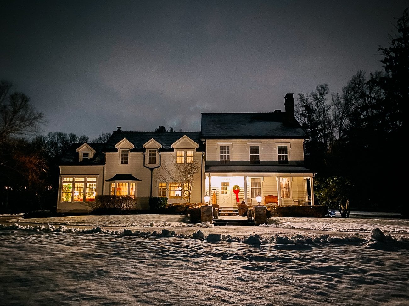Farmhouse at night in winter