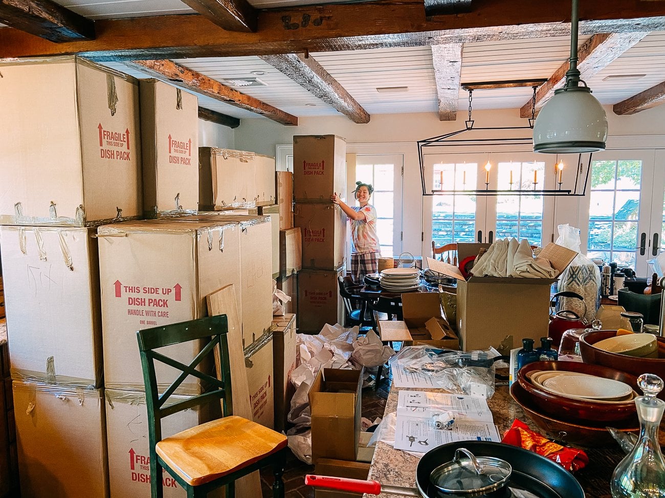 Sarah unpacking boxes