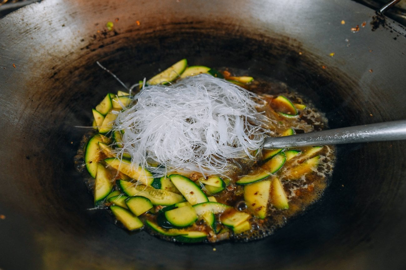 adding glass noodles to zucchini