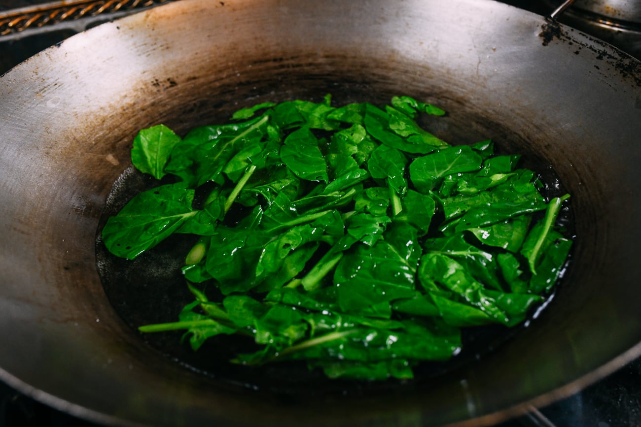 blanching chinese broccoli in wok