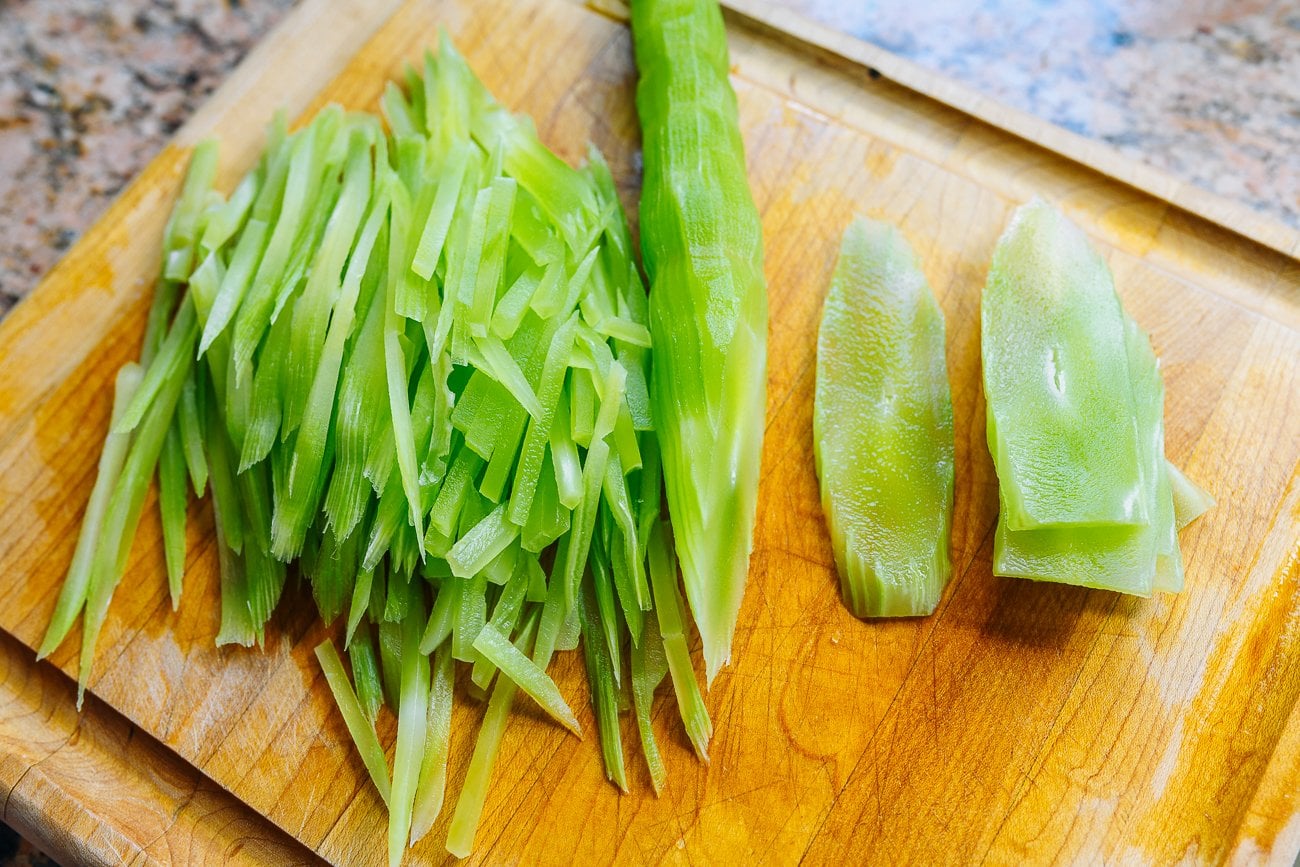 julienned celtuce on cutting board