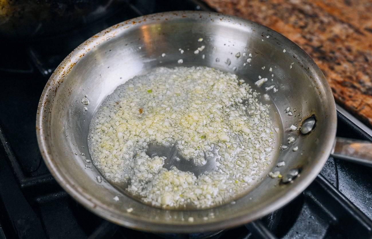 garlic sizzling in pan